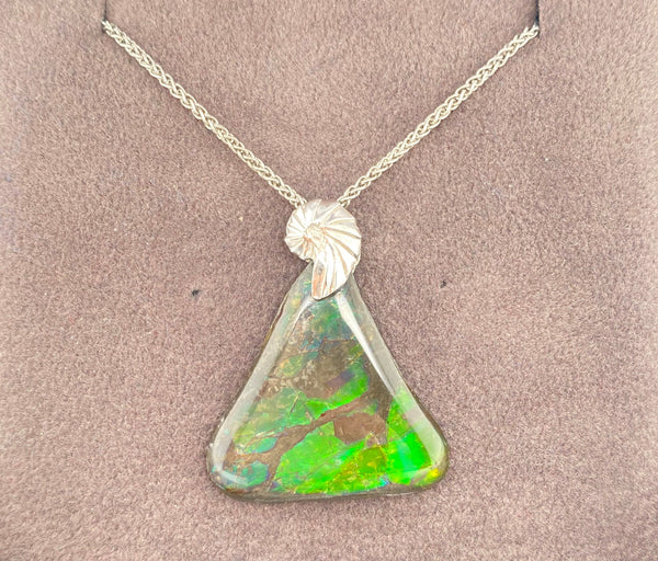 Ammolite Freeform Pendant that is 28x27mm PN E004248