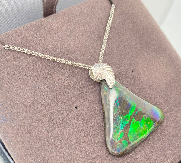 Ammolite Freeform Pendant that is 28x27mm Left View PN E004248