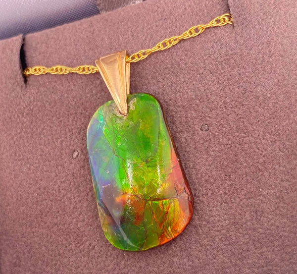 Ammolite Freeform Pendant that is 15X25MM Right View PN E1379
