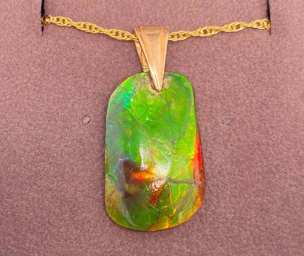 Ammolite Freeform Pendant that is 15X25MM PN E1379