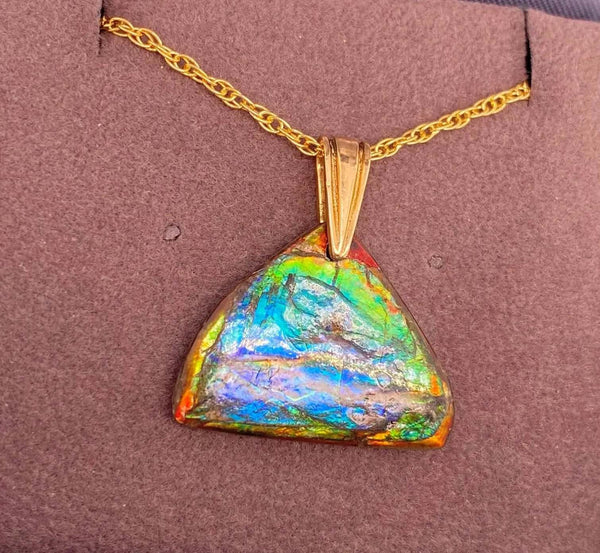Ammolite Freeform Pendant that is 21X25MM PN E13562