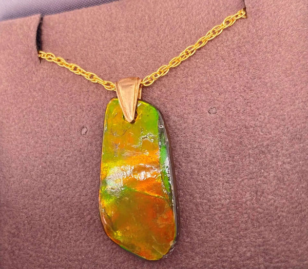 Ammolite Freeform Pendant that is 26X13MM Right View PN E20661