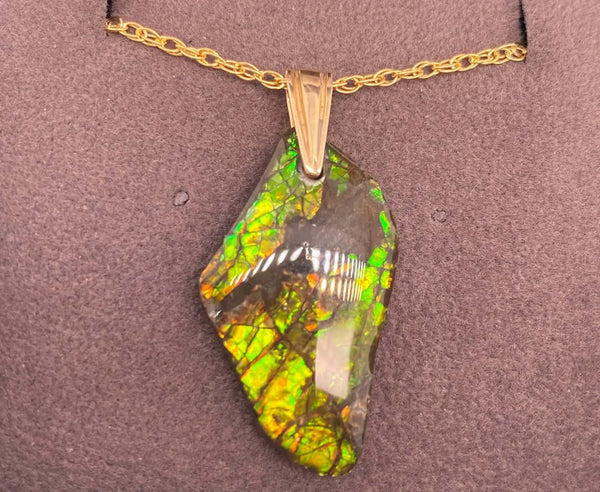 Ammolite Freeform Pendant that is 27x15mm PN E134S