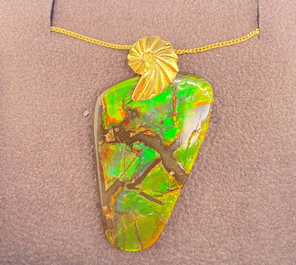 Ammolite Freeform Pendant that is 31x20mm PN E20381