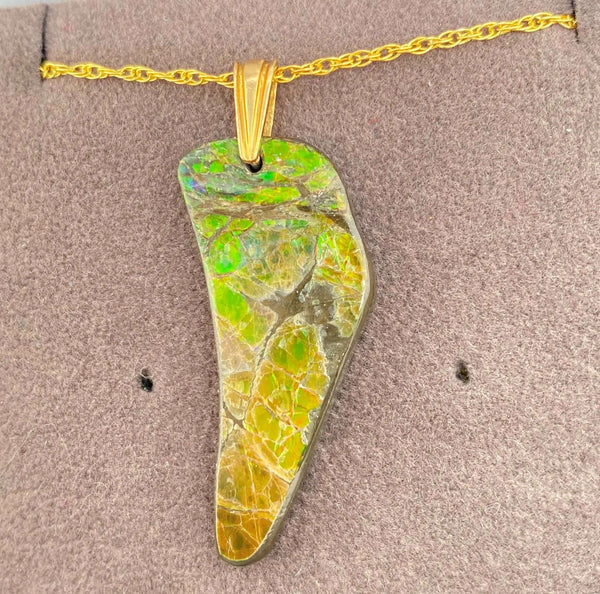 Ammolite Freeform Pendant that is 38x14mm Left View PN E134C