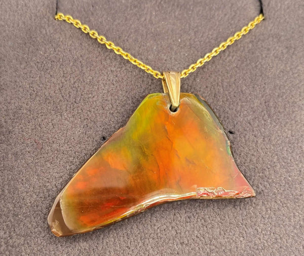 Ammolite Freeform Pendant that is 44x24mm PN E134L