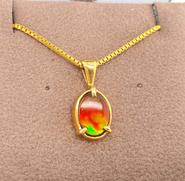 Ammolite Gold Pendant with an Oval Gem Set in 14KYG Left View PN E20824