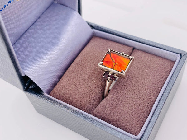 Ammolite Ring With Four Garnets Accent Stones Set in Silver Left View PN E20693