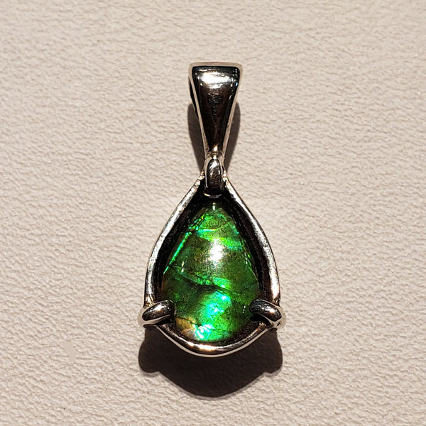 Genuine Ammolite 6x9mm Petite Pear Silver Pendant. PN. E20053 %product from Empire Ammolite