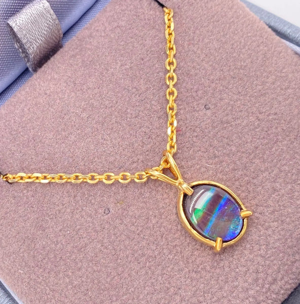 Genuine Ammolite Oval Pendant in 18KYG Left View PN E20573