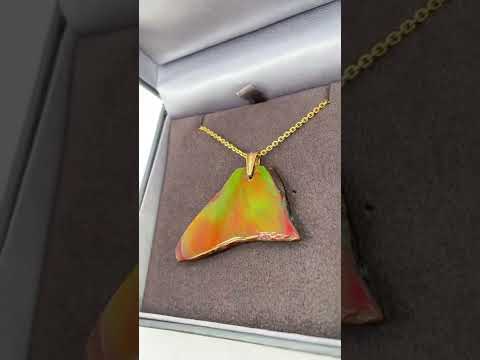Ammolite Freeform Pendant that is 44x24mm Video PN E134L