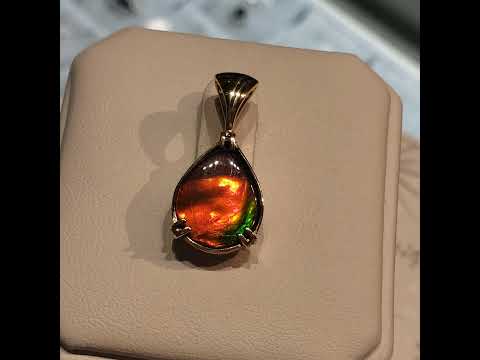 Genuine Alberta Ammolite 10x12MM Pear Shaped Pendant Video