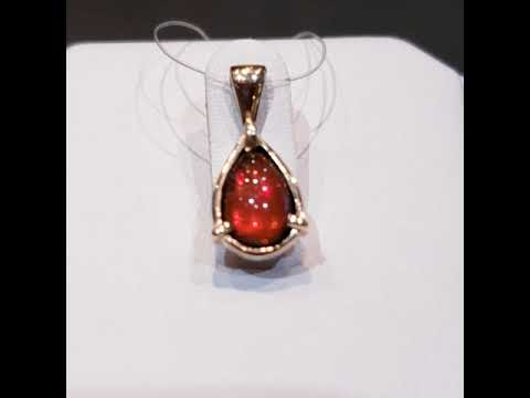 Ammolite Pendant Video with 6X9mm Petite Pear Gemstone set in 14K Yellow Gold.