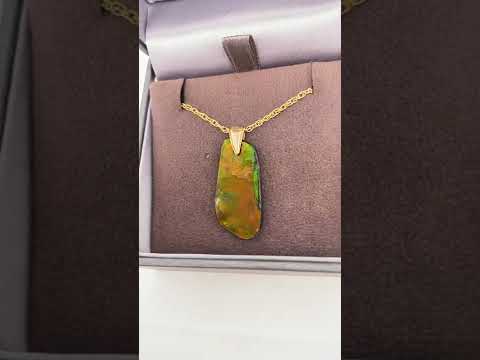 Ammolite Freeform Pendant that is 26X13MM Video PN E20661