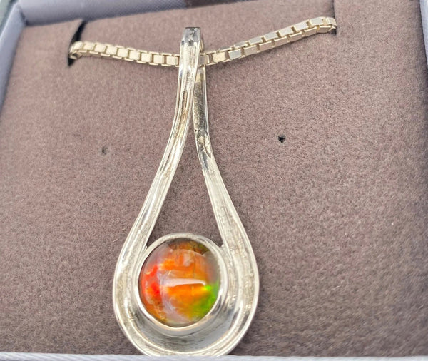 Ammolite Silver Pendant with an Infinity Design PN E10252