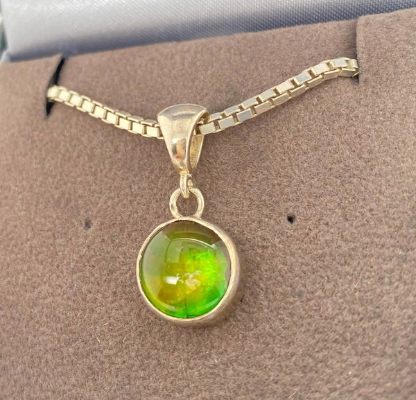 Ammolite Round Pendant Set in Sterling Silver Right View PN E1361D