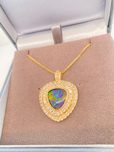 Ammolite Gold Pendant with Sixty Three White Topaz PN E21013