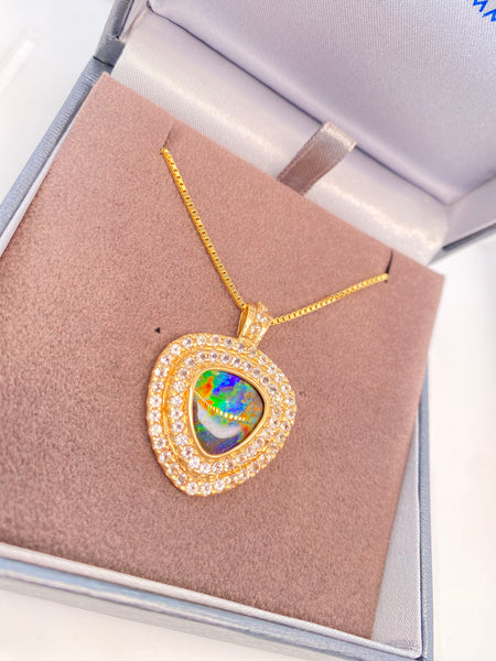 Ammolite Gold Pendant with Sixty Three White Topaz PN E21013