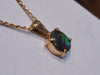 Ammolite Round Bezel set Gold Pendant with Green and Blue 