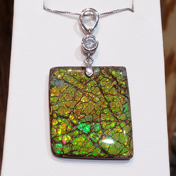 Silver Ammolite Freeform Pendant With CZ Accent Stone %product from Empire Ammolite