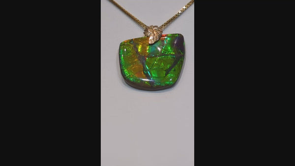 Ammolite Freeform Pendant Video that is 25x30mm PN E2123A