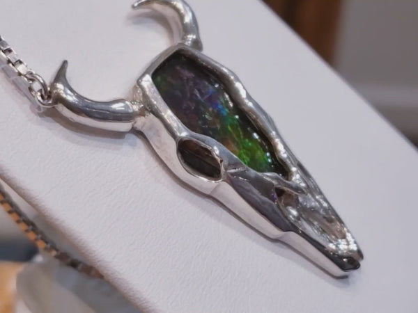Ammolite Pendant Origin Series Buffalo Pendant set in Sterling Silver with an integrated Silver Chain. The Gemstone colours include Green, Yellow and Blue.