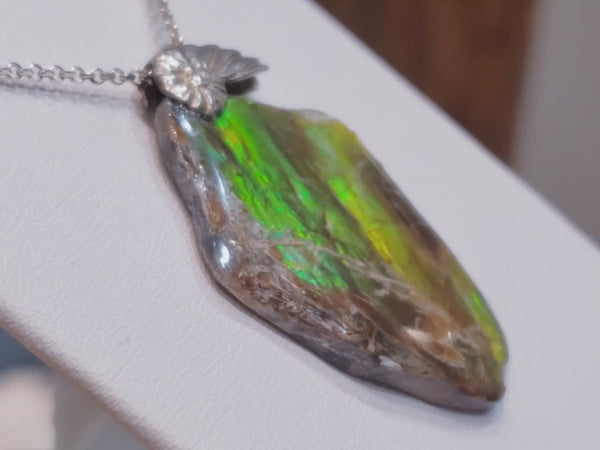 Ammolite Freeform With SLV Bale Yellow Orange Green. Pn. E134J