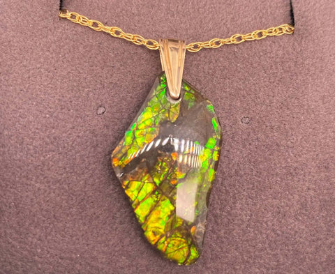 Ammolite Freeform Pendant that is 27x15mm PN E134S 