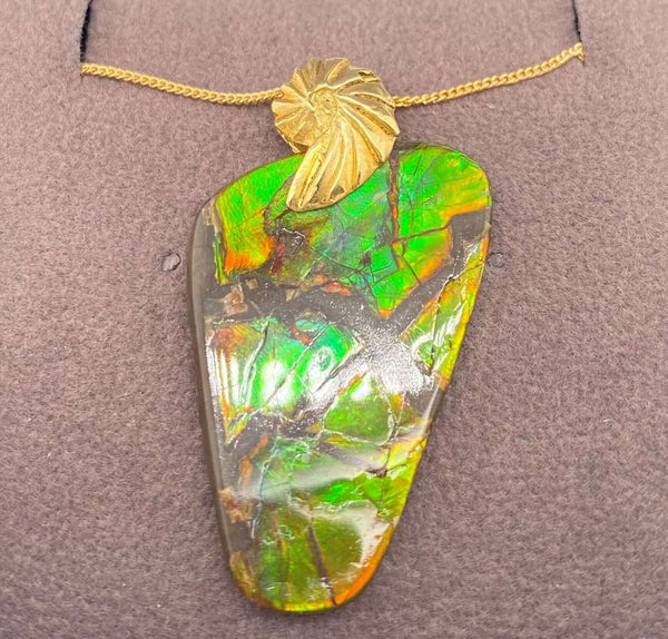 Ammolite Freeform Pendant that is 31x20mm Left View PN E20381 