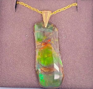 Ammolite Freeform Pendant that is 36x15mm PN E20812 