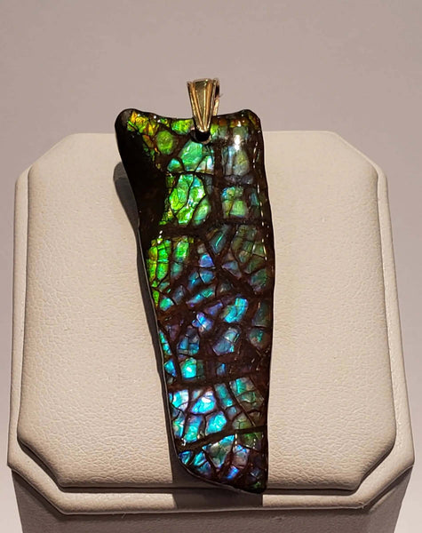 Ammolite Freeform Pendant that is 48x17mm Side View PN E1343