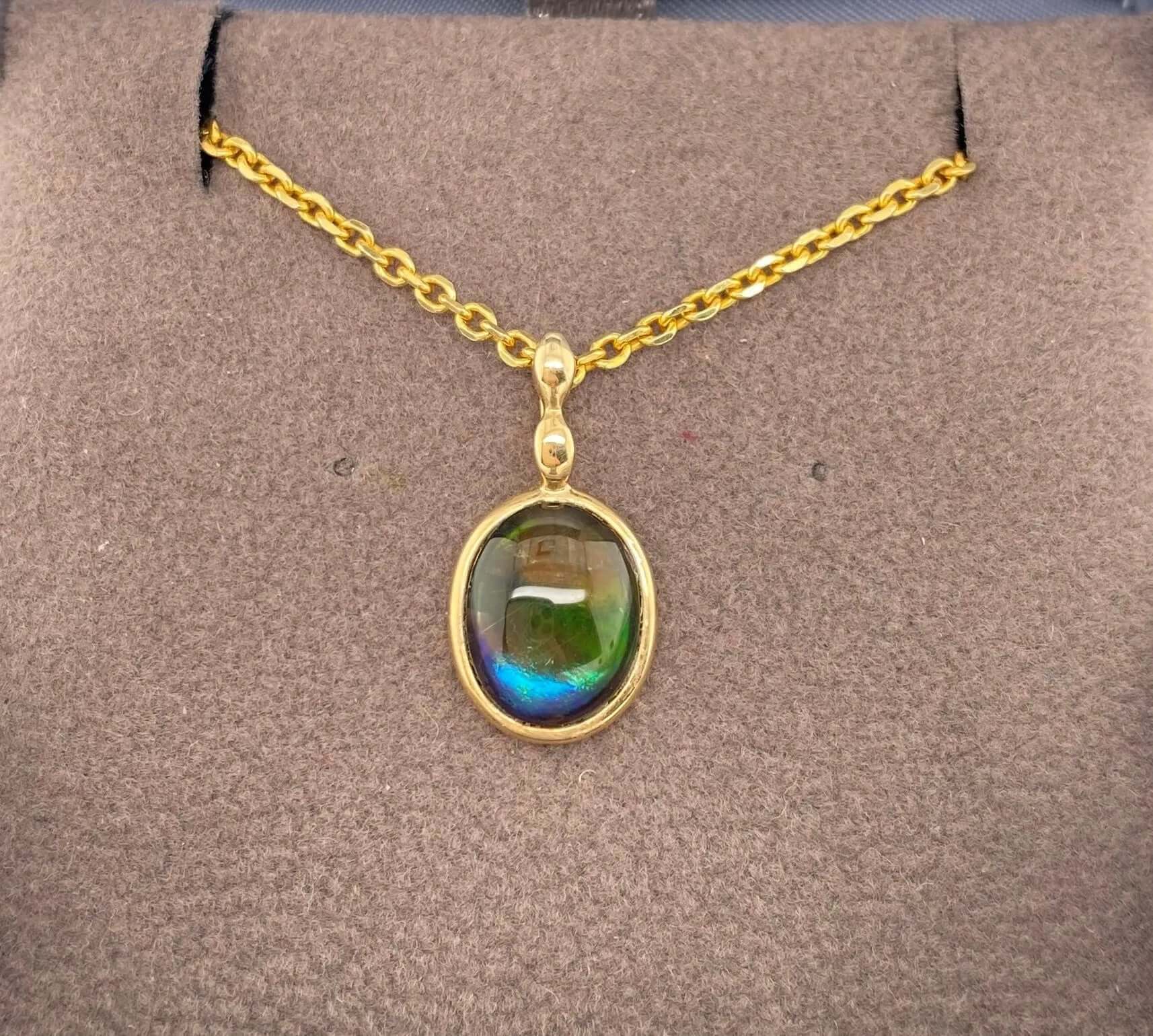 Ammolite Gold Oval Pendant with 8x10mm Gemstone PN E033713 