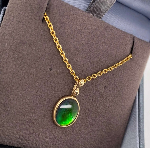 Ammolite Gold Oval Pendant with 8x10mm Gemstone Right View PN E1361Z 