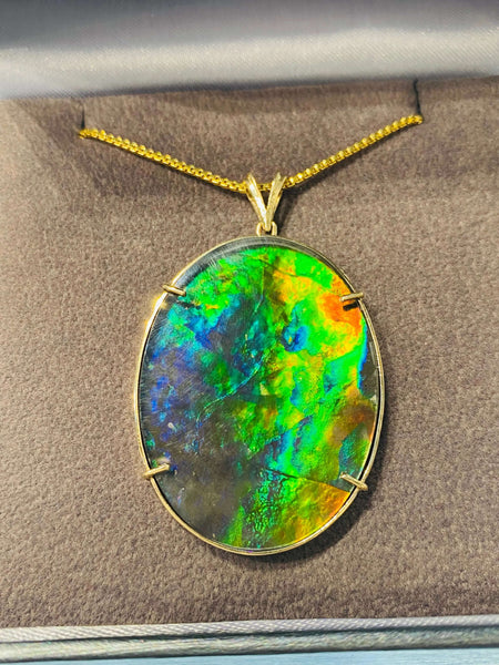 Ammolite Gold Pendant that is 30x40mm Oval PN E21281 %product from Empire Ammolite