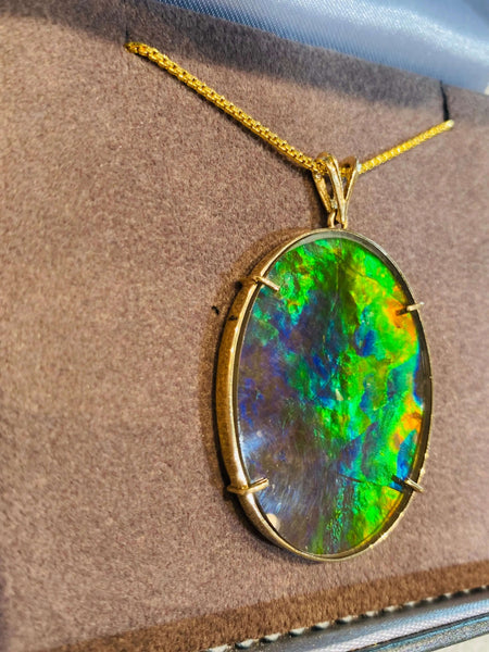 Ammolite Gold Pendant that is 30x40mm Oval PN E21281 %product from Empire Ammolite