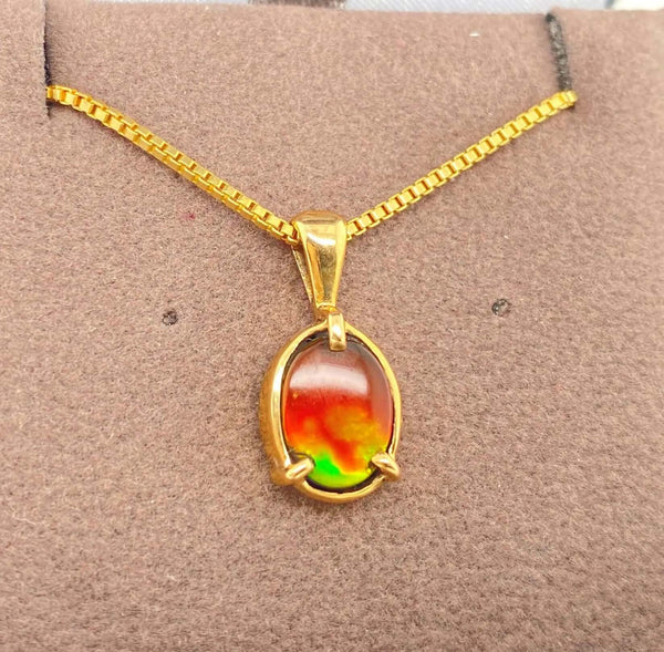 Ammolite Gold Pendant with an Oval Gem Set in 14KYG Left View PN E20824 