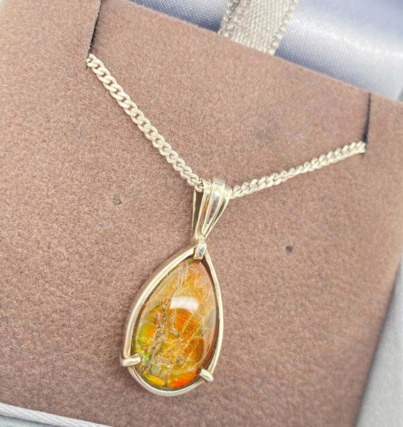 Ammolite Pear Pendant in Sterling Silver Left View PN E10462 
