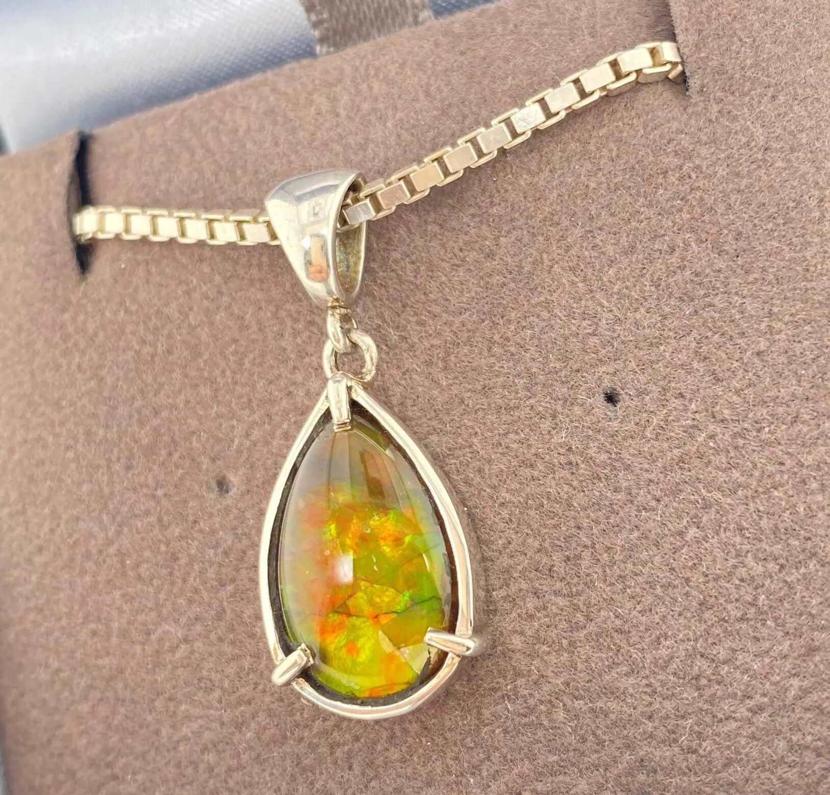 Ammolite Pear Pendant in Sterling Silver Left View PN E10613 