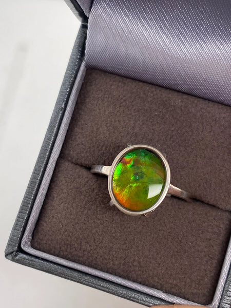 Ammolite Ring with a 10x12mm Oval Gem Set in Silver Right View PN AC10343
