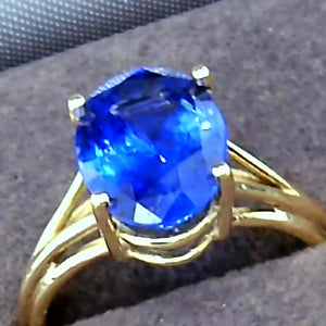 Royal Blue Sapphire Gold Ring that has a Large Gemstone PN: E72019 %product from Empire Ammolite