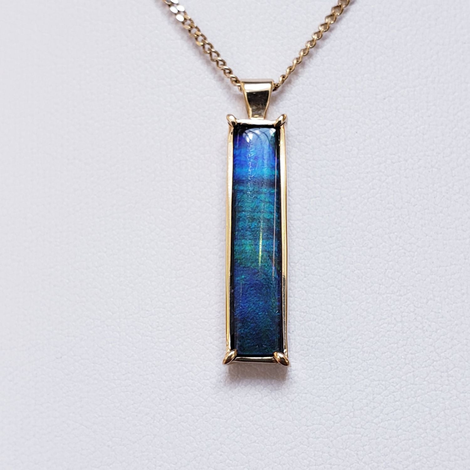 Ammolite Rectangle Gold Pendant with 5x25mm Gemstone Pn: E004242 %product from Empire Ammolite