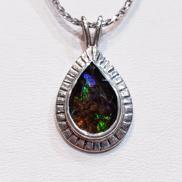 Ammolite Silver Aura Pendant with a 8x12mm Gemstone PN: E20374 %product from Empire Ammolite