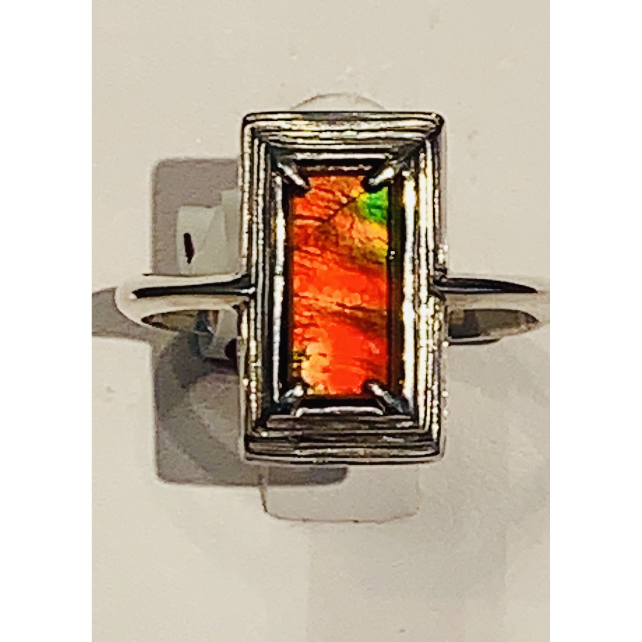 Ammolite Pyramid Ring with 5x10mm Gemstone Set in Silver  PN: E20894 %product from Empire Ammolite