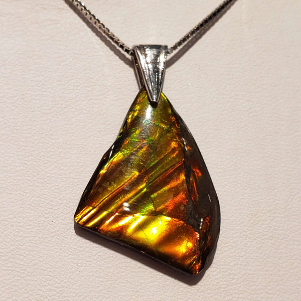 Ammolite Freeform Set in Sterling Silver with Ripples PN. E21192A %product from Empire Ammolite