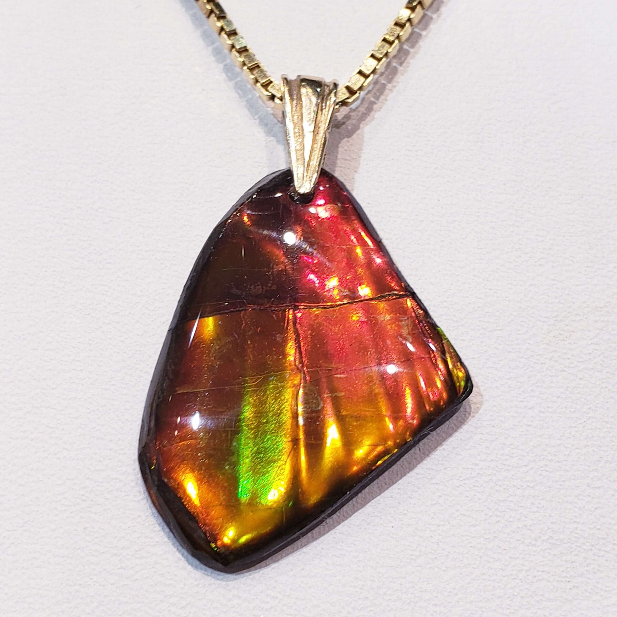 Ammolite Freeform Set in 14KYG with Ripple Pattern PN. E21193 %product from Empire Ammolite