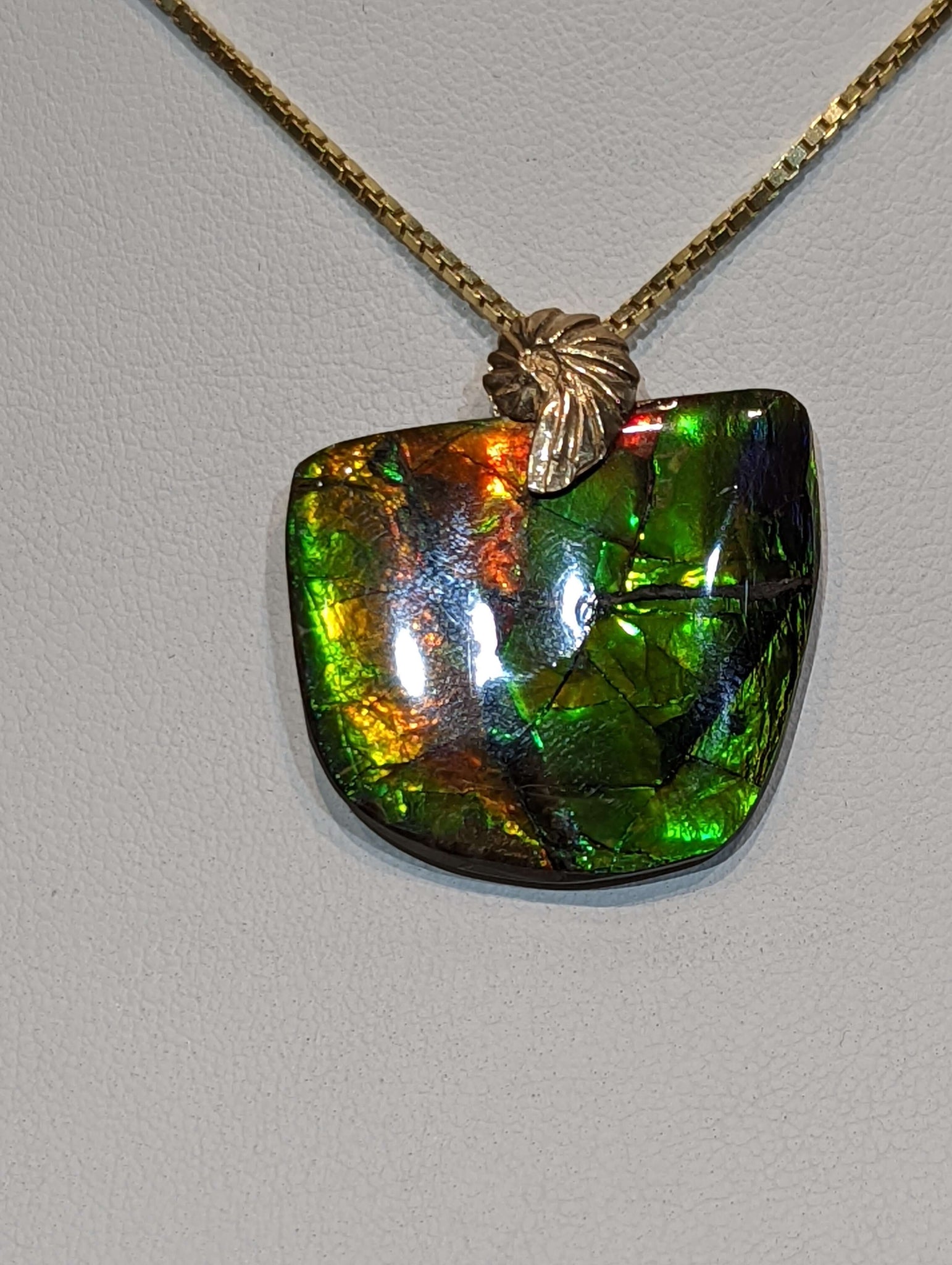 Ammolite Freeform Pendant that is 25x30mm PN E2123A %product from Empire Ammolite