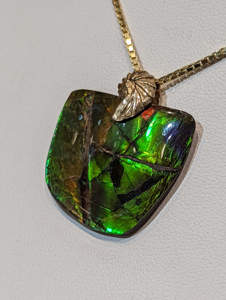 Ammolite Freeform Pendant that is 25x30mm PN E2123A %product from Empire Ammolite