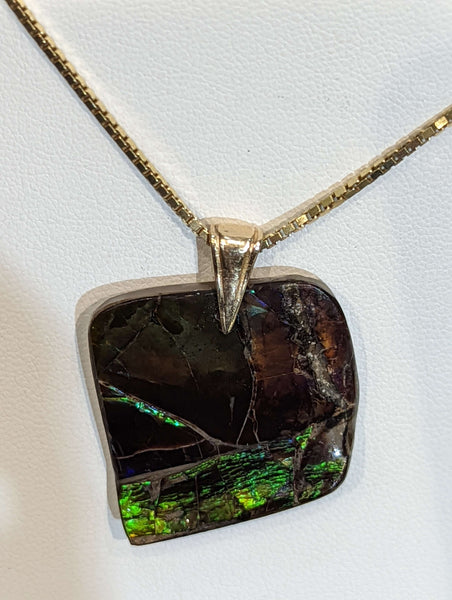 Ammolite Freeform Pendant that is 30x35mm PN E2123C %product from Empire Ammolite