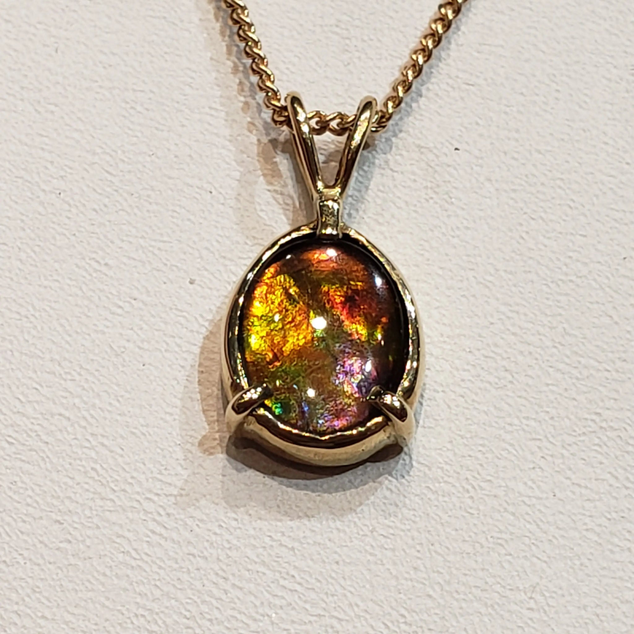 Genuine Ammolite 7X9MM Oval Pendant In 18KYG  PN. E20574 %product from Empire Ammolite
