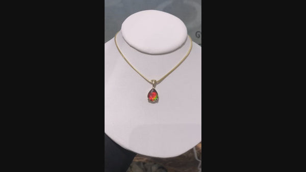 Ammolite Pear Pendant Set in 14KYG with a 10x12mm Gem Video  PN: E21024